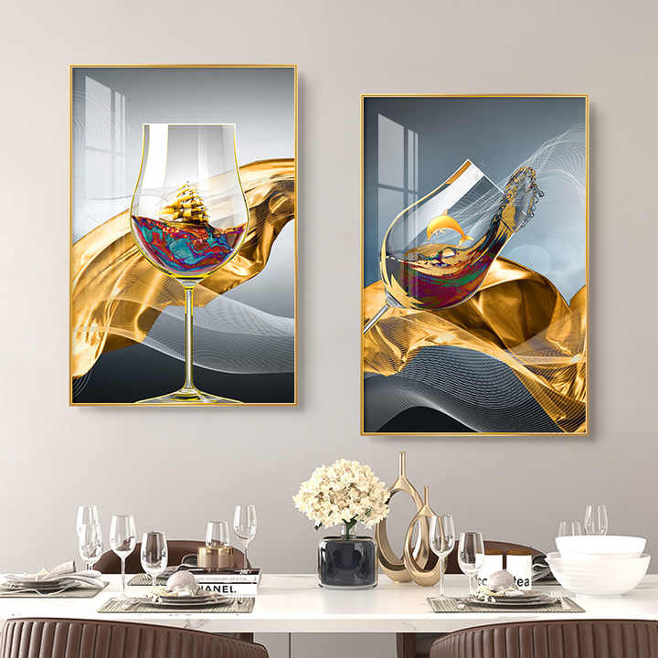 A sophisticated wall art set featuring golden wine glasses with elegant splashes of liquid gold, set against a deep black background, perfect for luxury dining room decor.