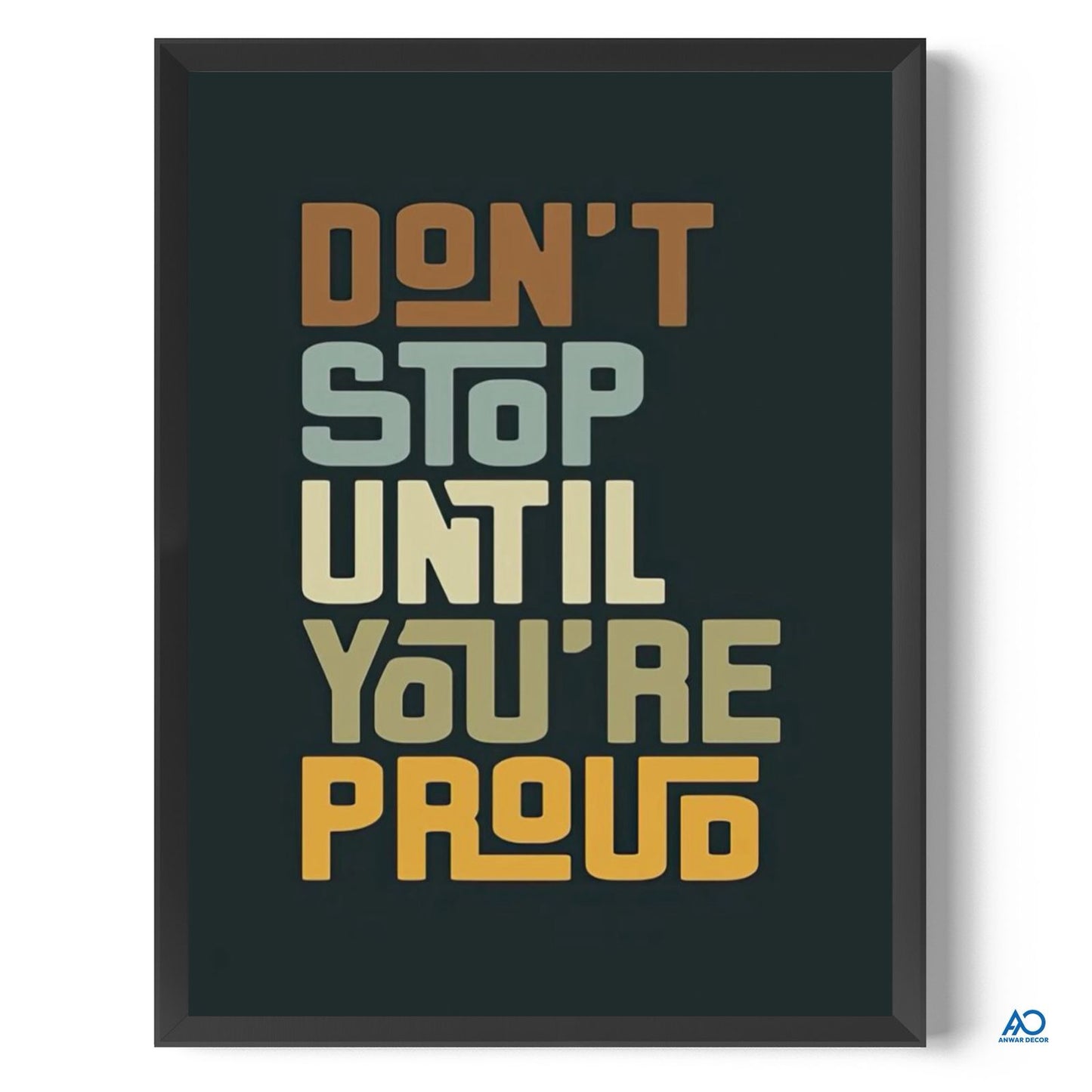 Framed poster with motivational quote 'Don't stop until you're proud' on a dark background