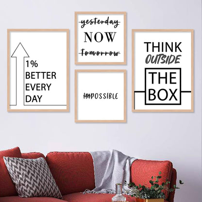  A 4-piece motivational wall frame set with black and white typography, including phrases like "Think Outside the Box," "1% Better Every Day," "Now," and "Impossible" with 'Im' crossed out.