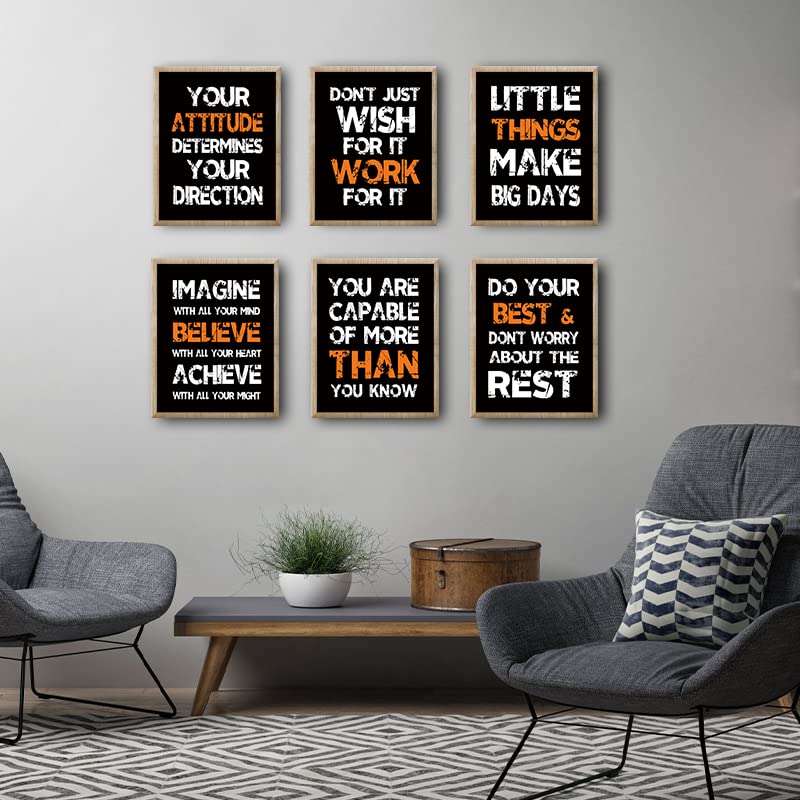 A set of motivational wall frames with powerful quotes in black and orange design, perfect for office and home decor.