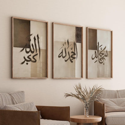 Three framed pieces of calligraphy art on a wall above a sofa in a living room.
