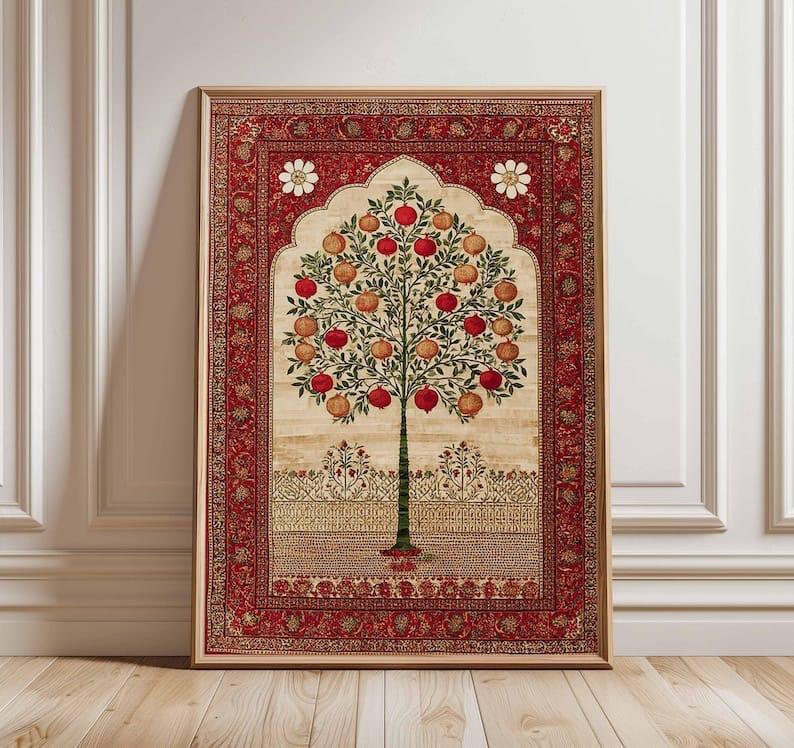 Decorative wall art with a tree of life design on a red background, framed in gold.