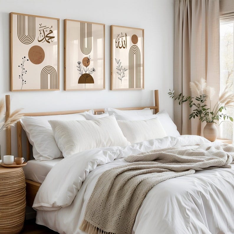 Neatly made bed with white bedding and beige blanket, framed artwork on the wall, and a side table with a cup.